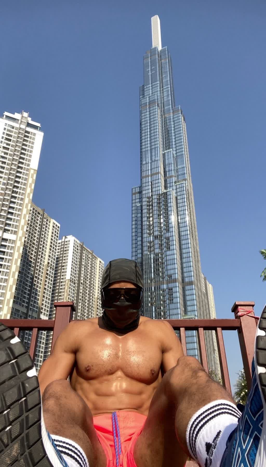 OYOTTA in warm-lit masked portrait